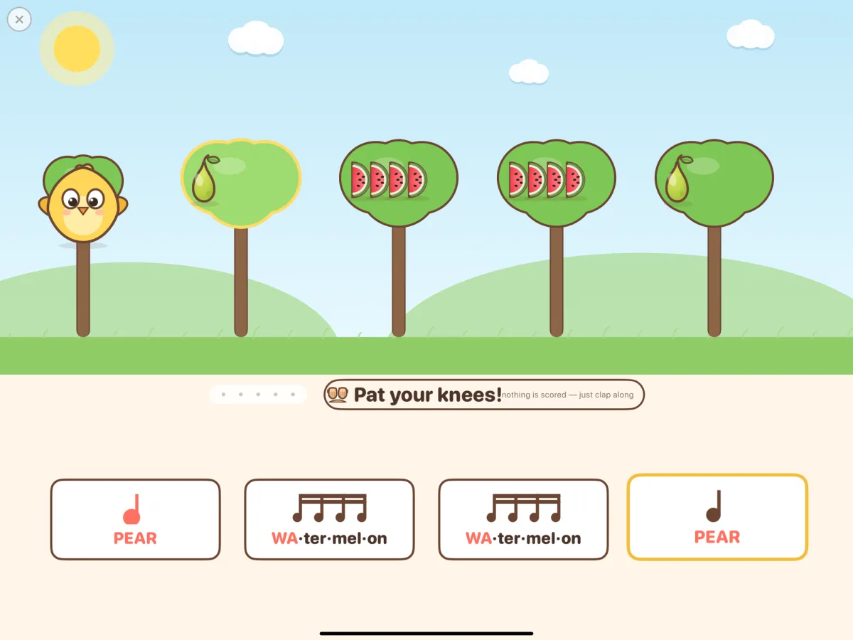 A bar of fruit words — pear, watermelon, watermelon, pear — with their rhythm notation, and Pippo the chick on the first tree during the clap-along warm-up